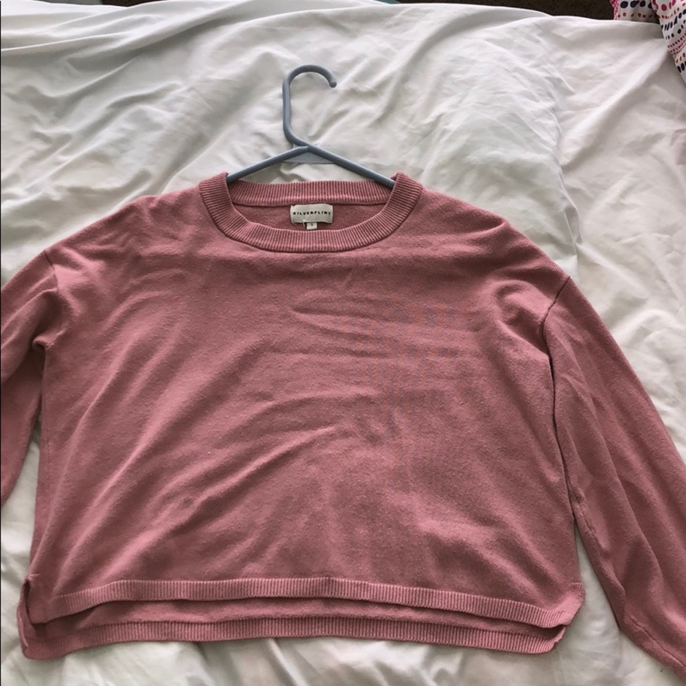 light pink sweater, cropped